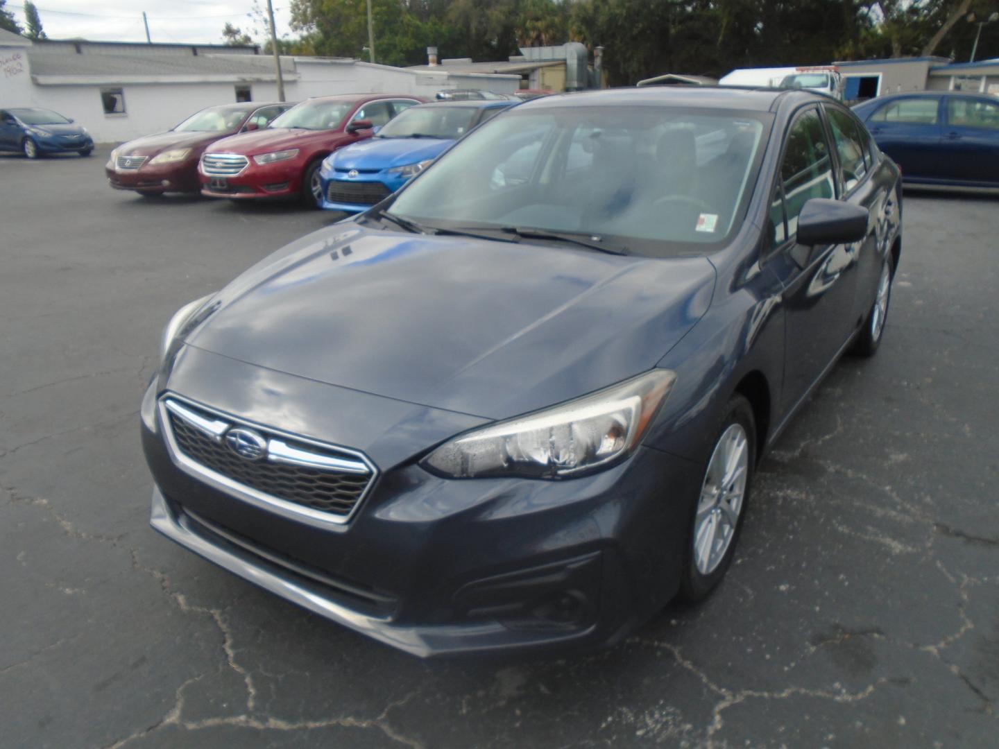 2017 Subaru Impreza 2.0i Premium CVT 4-Door (4S3GKAB65H3) with an 2.0L H4 DOHC 16V engine, CVT transmission, located at 6112 N Florida Avenue, Tampa, FL, 33604, (888) 521-5131, 27.954929, -82.459534 - Photo#1